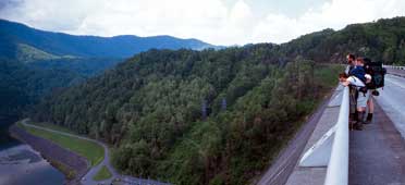 photo of hikers atop Fontana Dam